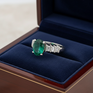 Estate Oval Emerald and Diamond Platinum Ring — side view