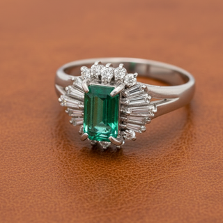 Estate Emerald and Diamond Platinum Halo Ring