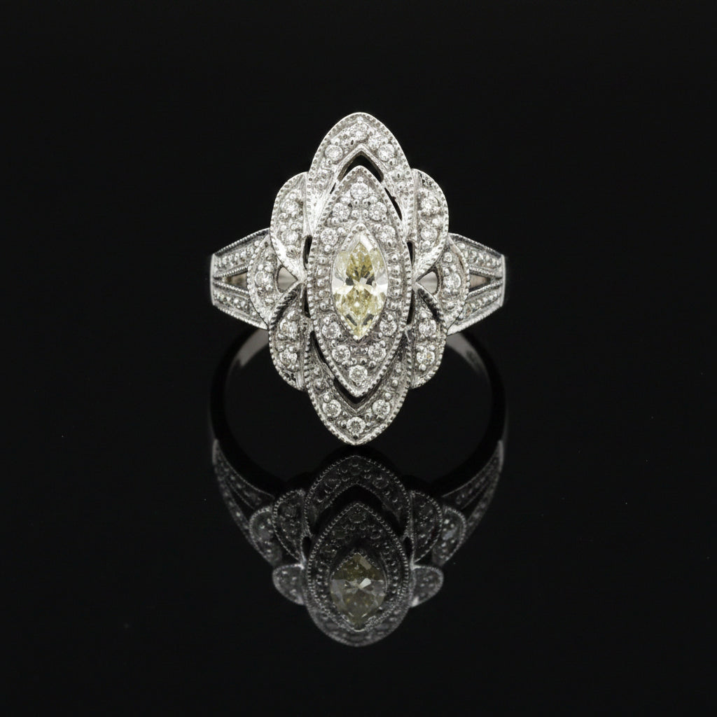 Estate jewelry — A Filigree Ring, Elongated, in White Gold, elongated filigree diamond ring in 14K white gold