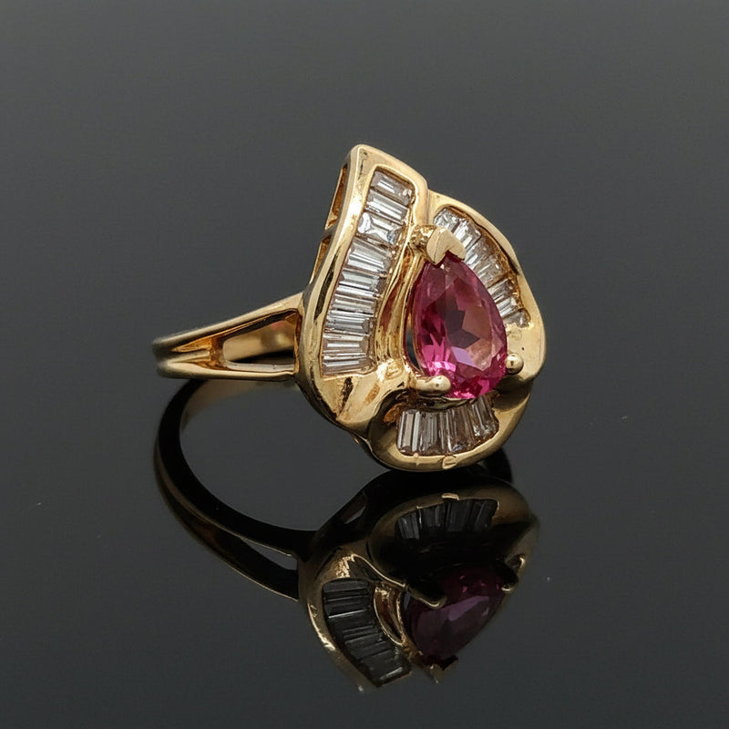 Estate jewelry — A Pink Tourmaline Swirl, in Two-Tone Gold, 0.75 ctw diamonds