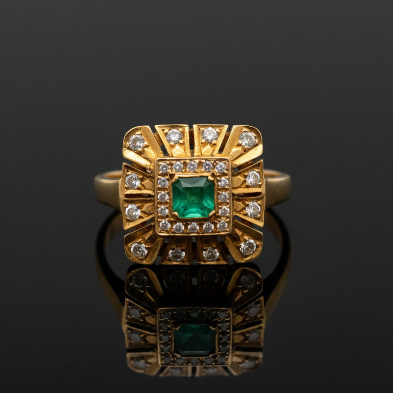 Estate jewelry — An Emerald, in a Gold Sunburst, 0.40 ctw diamonds