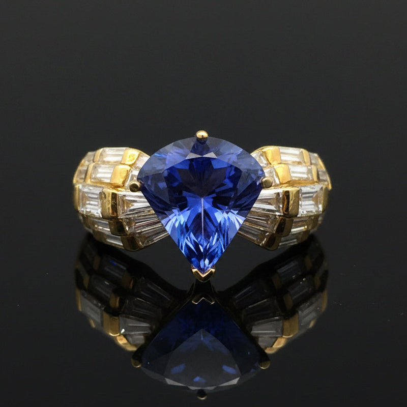 Estate jewelry — A Tanzanite Trilliant, in Yellow Gold, 2.10 ctw diamonds