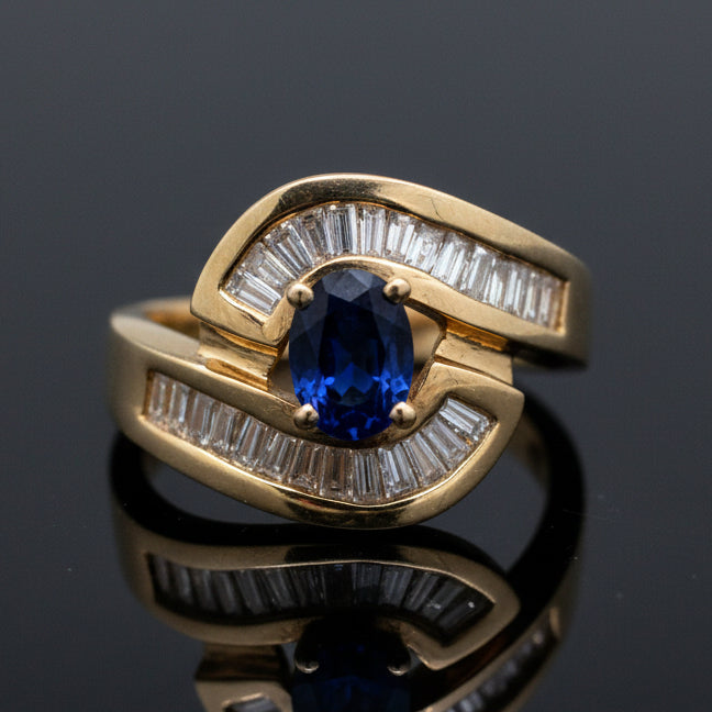 Estate jewelry — A Sapphire, Wrapped in Baguettes, 0.75 ctw diamonds
