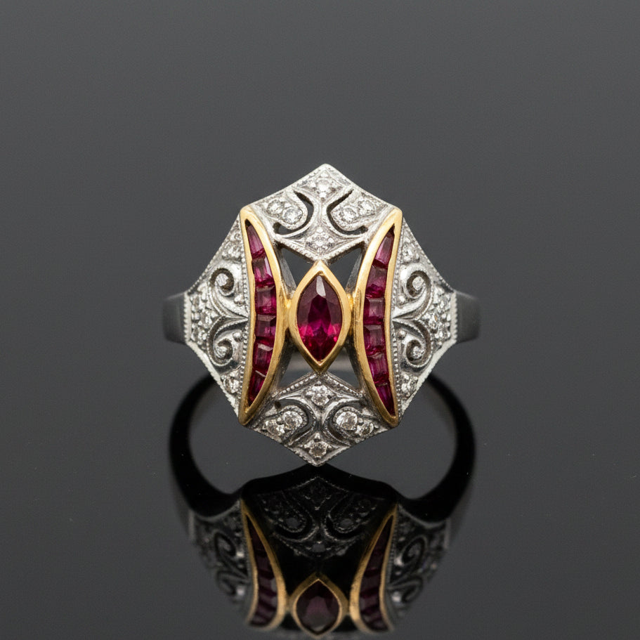 Estate jewelry — Scrollwork, Set with Two Cuts of Ruby, ruby and diamond scroll ring in 18K two-tone gold, 0.80 cttw ruby