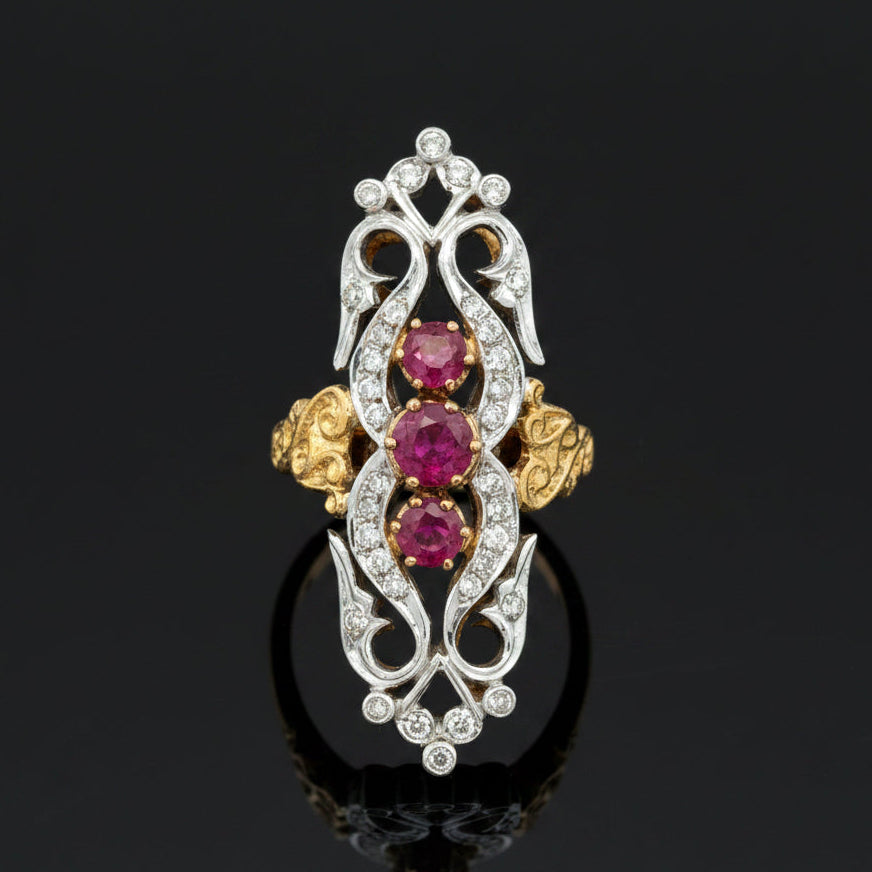 Estate jewelry — Lace, Cast in Two Golds, ruby and diamond ring in 18K two-tone gold, 0.60 cttw rubies