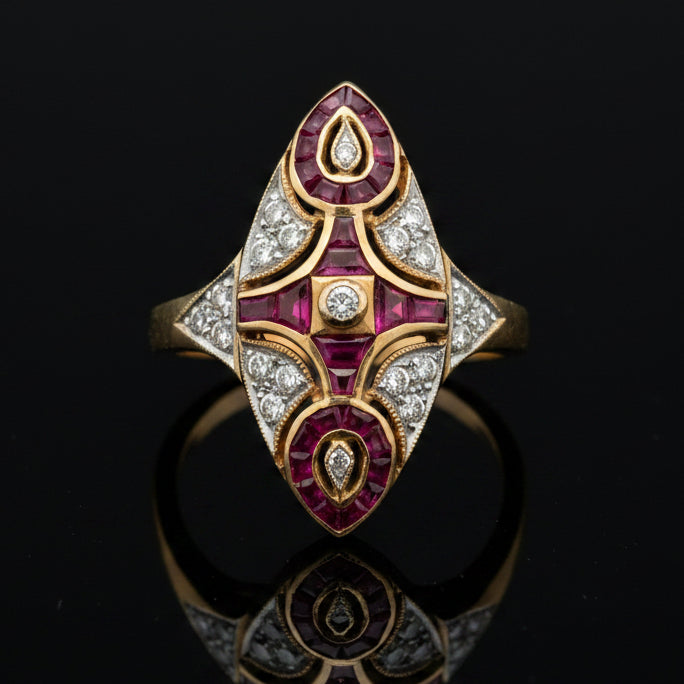 Estate jewelry — A Shield, Cast in Contrast, ruby and diamond shield ring in 18K two-tone gold, 1.50 cttw ruby