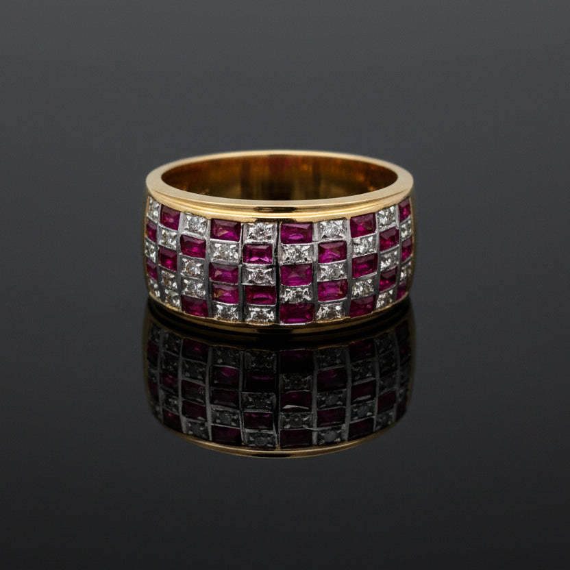 Estate jewelry — A Checkerboard Ruby, in Two-Tone Gold, Ruby, pear cut, 1.30 cttw