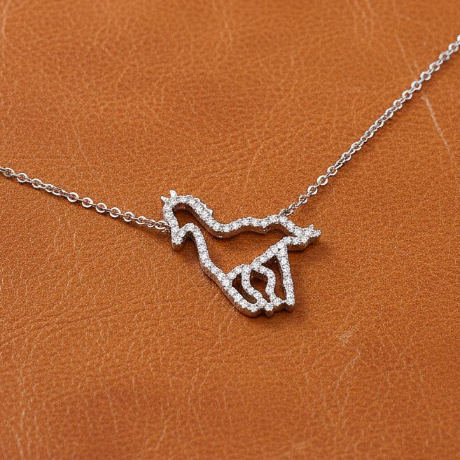Estate jewelry — Clyde Duneier Diamond and 14K White Horse Silhouette Necklace, Diamonds 0.29 ctw