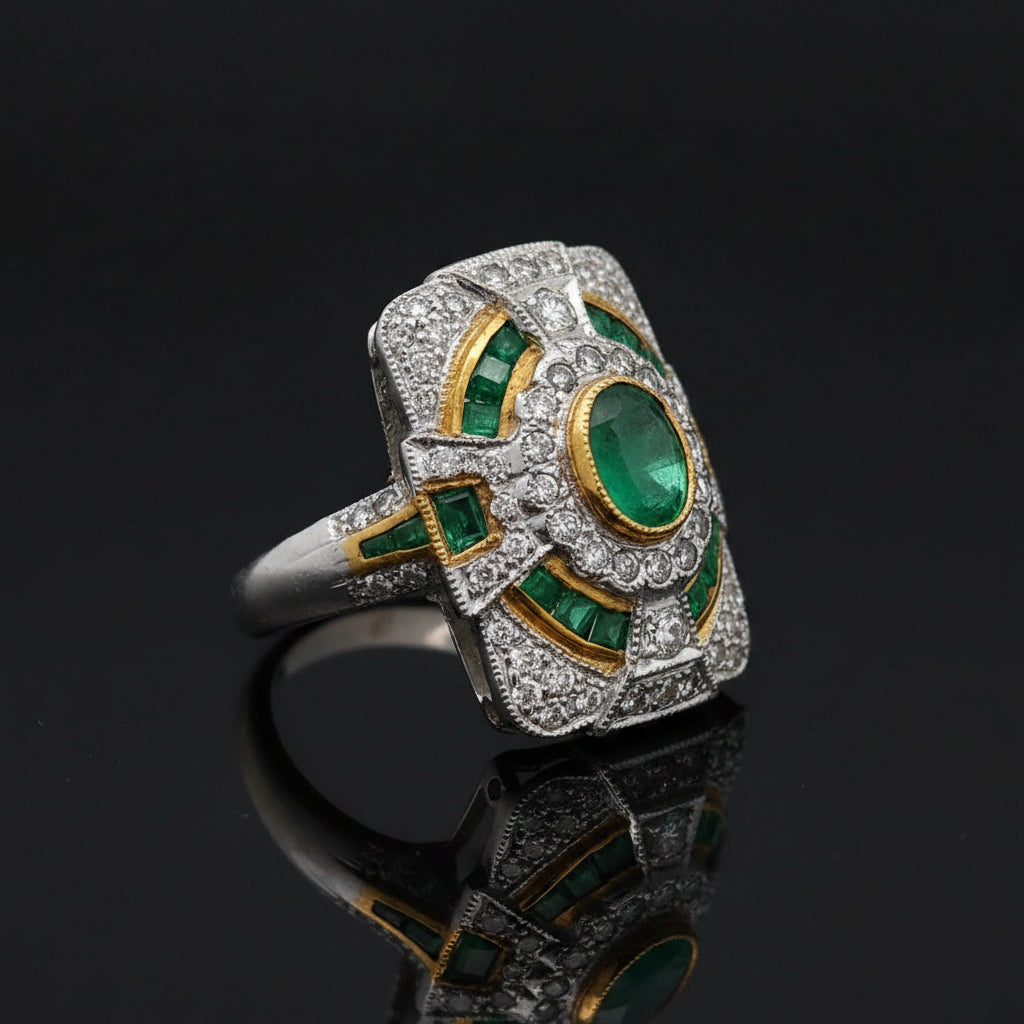 Estate jewelry — An Emerald, in Two-Tone Gold, Emerald, oval/pear cut, 1.93 cttw