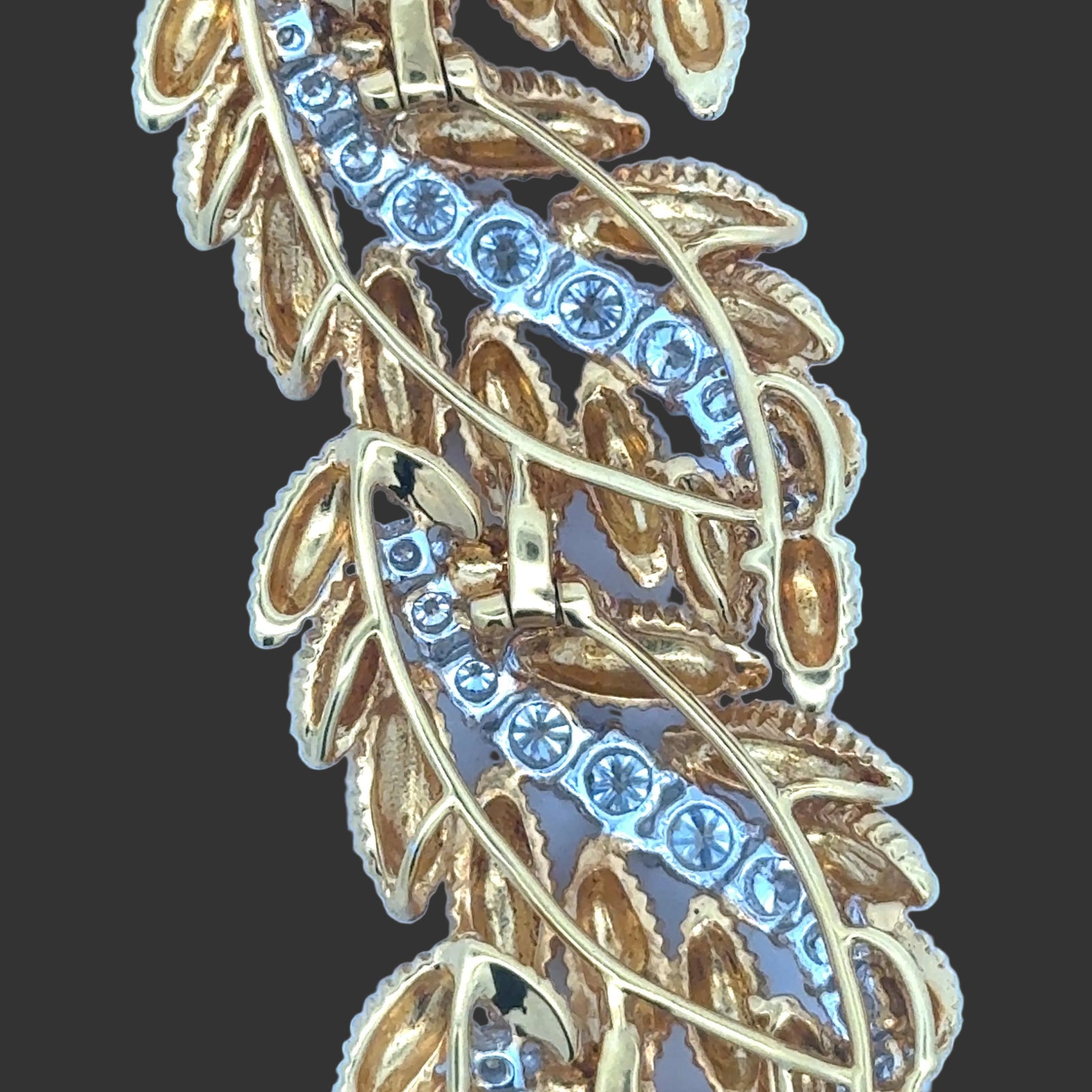 Estate jewelry — Estate 10.27ctw Diamond Textured Leaf Motif 18K Yellow and White Gold Bracelet