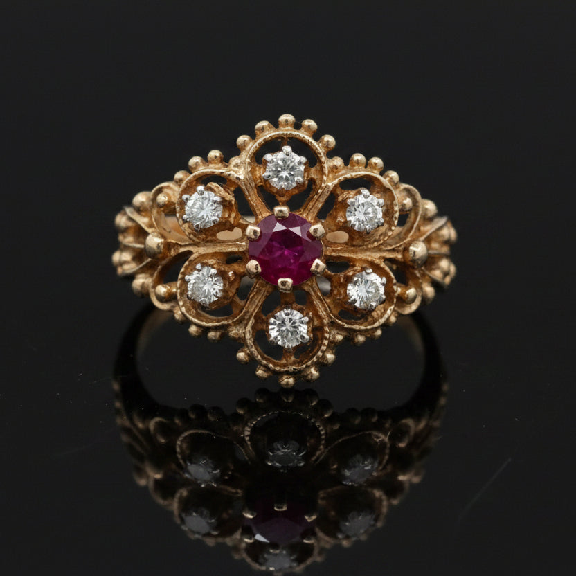 Estate jewelry — A Ruby Cluster, in Yellow Gold, Ruby, round cut, 0.35 cttw