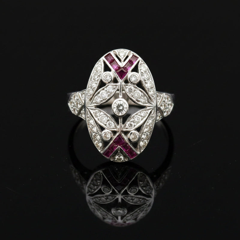 Estate jewelry — A Ruby in Open Oval Work, in White Gold, Ruby, pear cut, 0.25 cttw, SI1-SI2 clarity