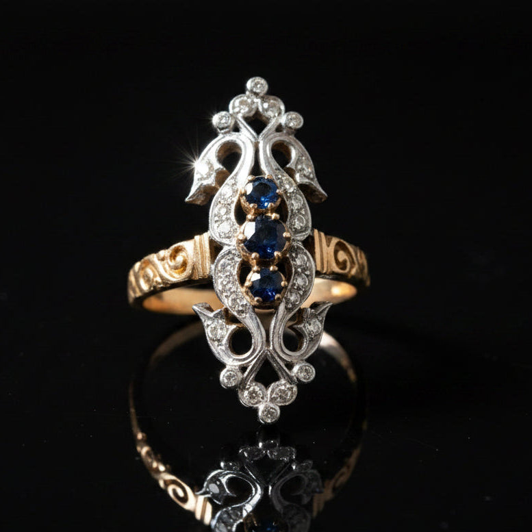 Estate jewelry — A Sapphire Line, in Two-Tone Gold, Sapphire, round cut, 0.25 cttw (3 stones)